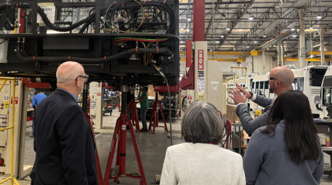 Fed Reserve visitors at ENC bus manufacturing facility