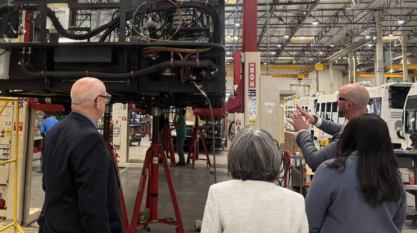 Fed Reserve visitors at ENC bus manufacturing facility