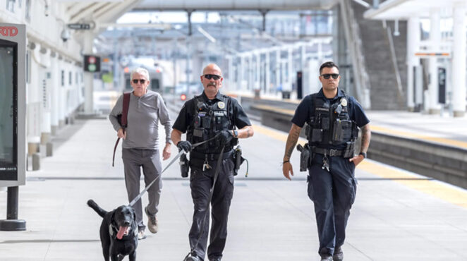Two officers patrol a station