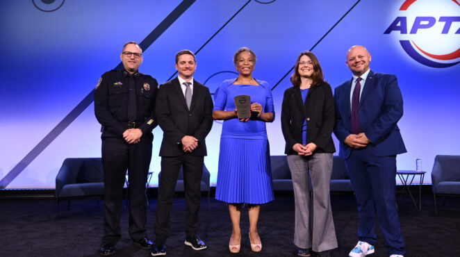 APTA award winners pose on stage