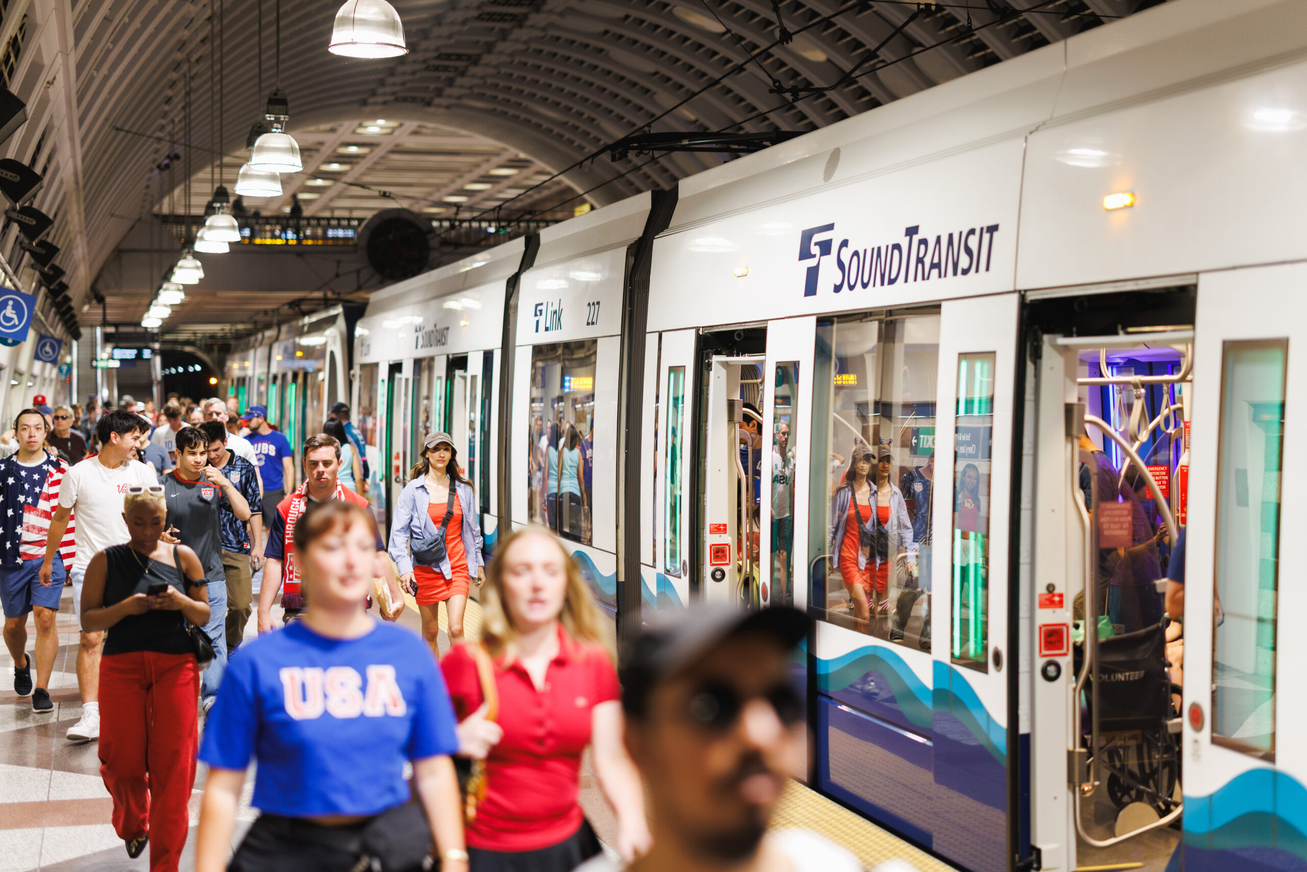 Fans on Link arrive at Pioneer Square Station for the FIFA World Cup game in Seattle between the USA and Belguim on July 6, 2026.