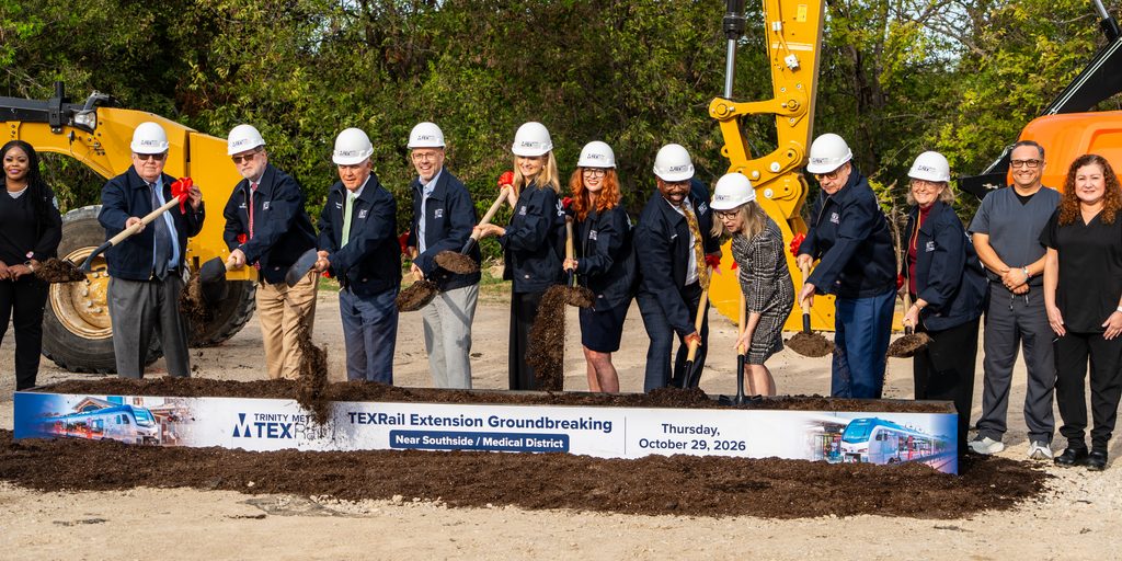 Trinity Metro leaders and others break ground. 